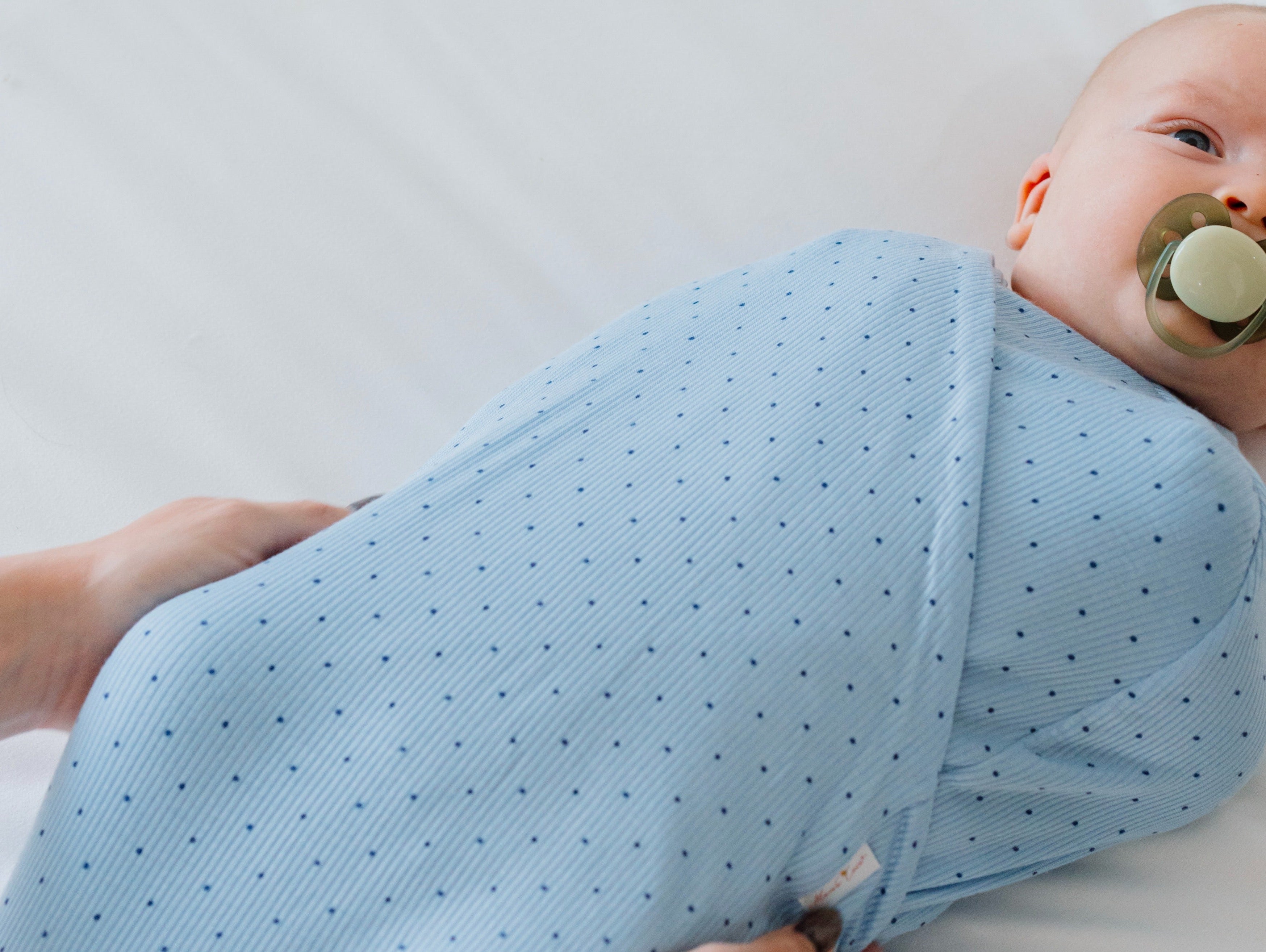 How to Choose the Right Swaddle for Your Newborn’s Sleep Style