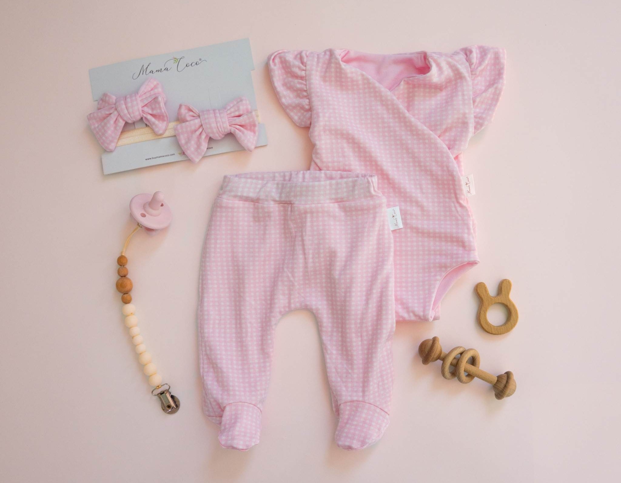 Baby Pink Gingham footie pants shown with matching outfit made from breathable silky modal fabric.