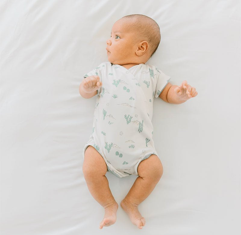 WINGED BODYSUIT - Mama Coco in desert sunsets design in classic brushed fabric.