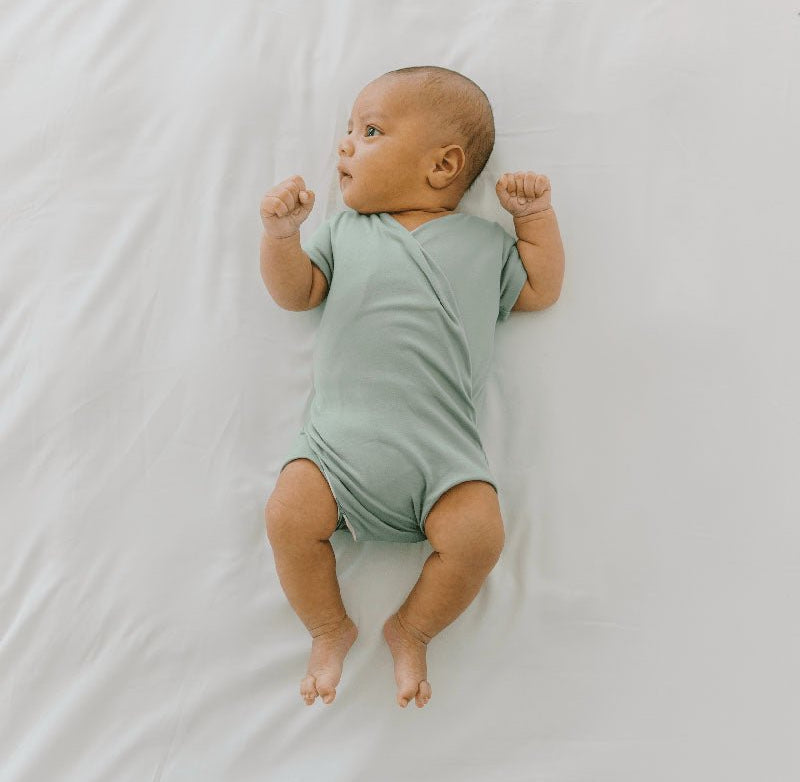 WINGED BODYSUIT - Mama Coco in desert sunsets design in classic brushed fabric.