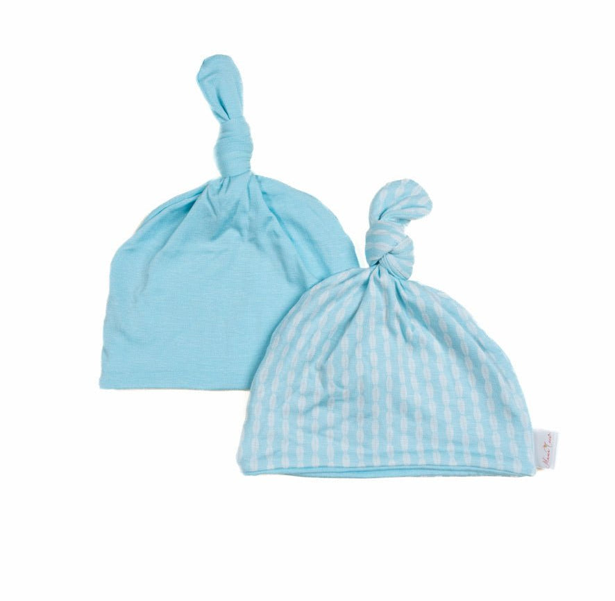 Reversible baby beanie from our long-sleeve onesie outfit bundle.