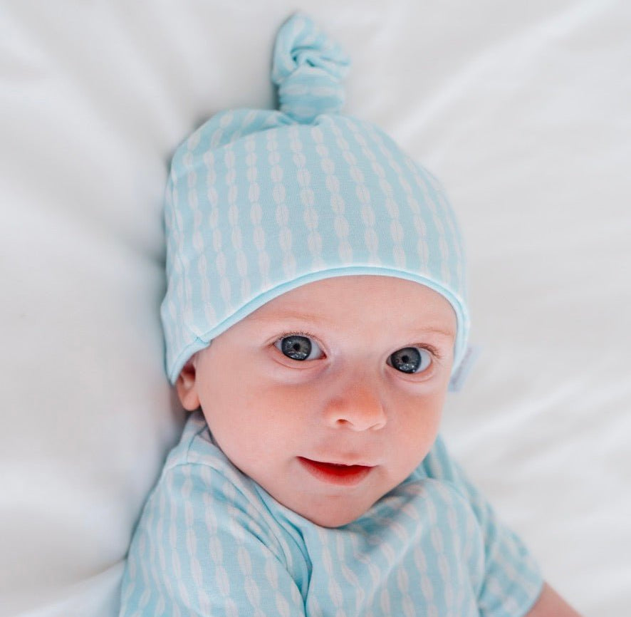 Baby beanie from our long-sleeve onesie outfit bundle.