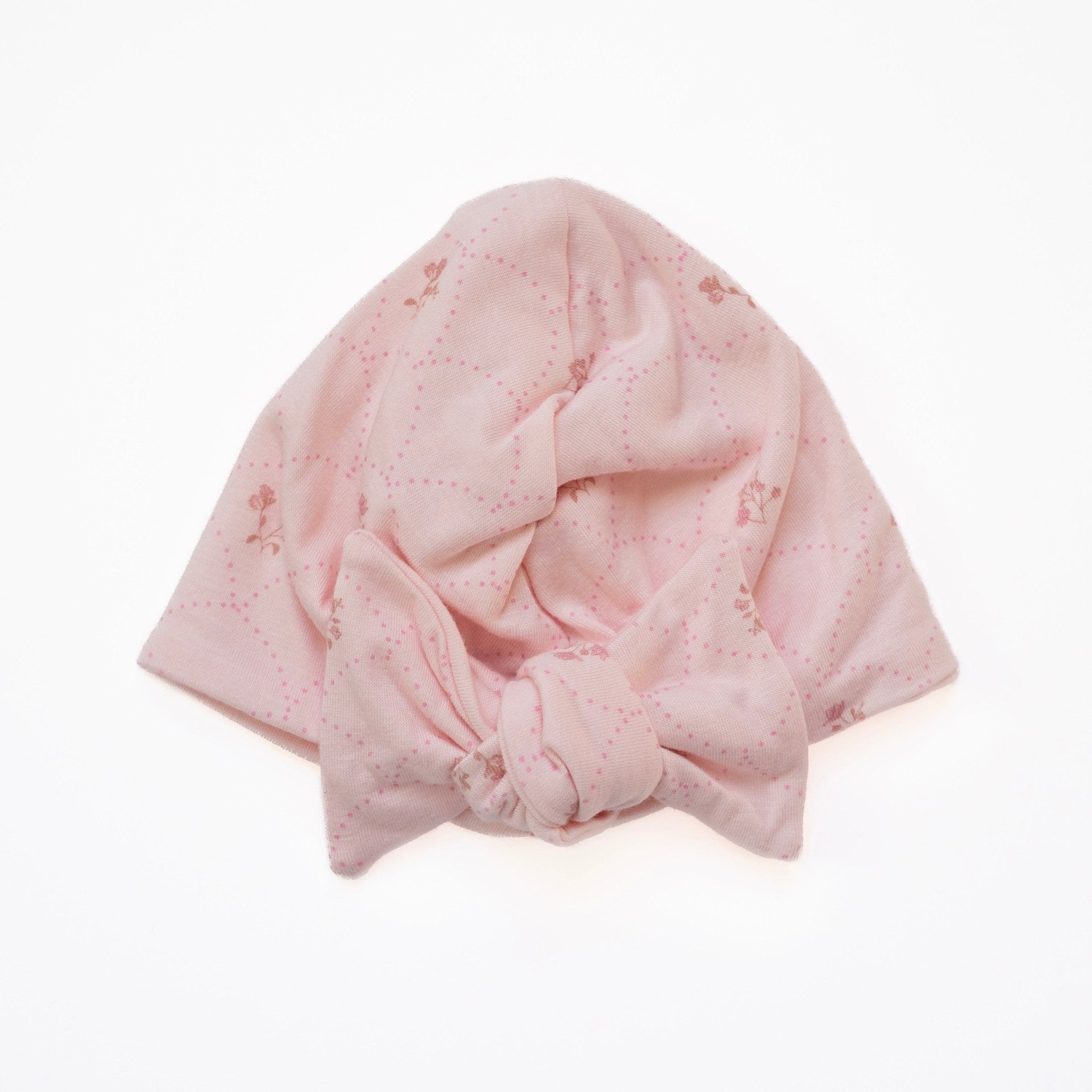 Bamboo cotton baby beanie with ruched bow in dainty dots design.