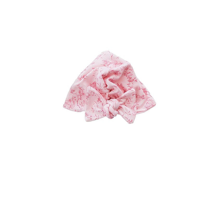 Bamboo cotton baby beanie with ruched bow in whimsical garden design.