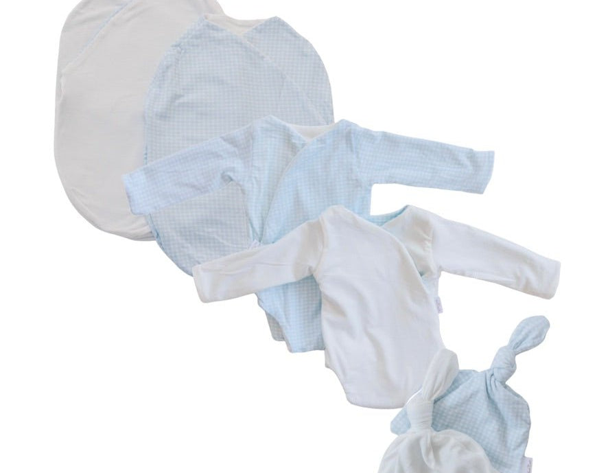 Newborn bundle with long sleeve essentials in silky modal fabric with baby blue gingham design.