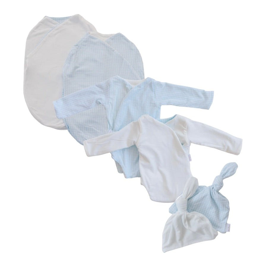Newborn bundle with long sleeve essentials in silky modal fabric with baby blue gingham design.