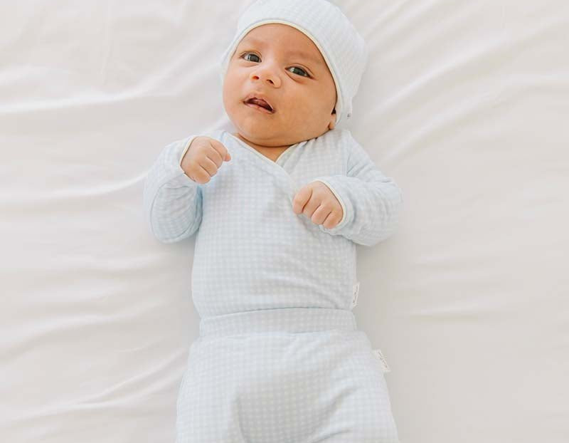 Baby blue gingham long sleeve winged bodysuit.