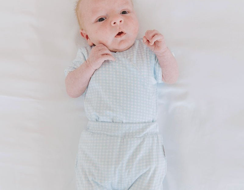 Baby winged bodysuit made from silky modal fabric in Baby Blue Gingham design.