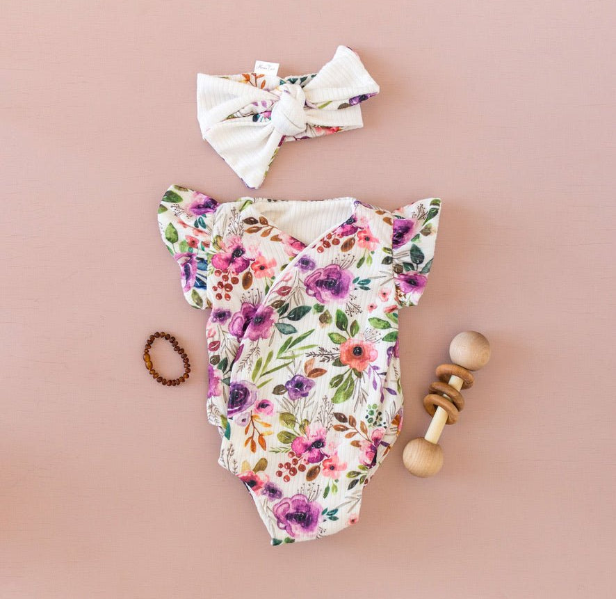 Ivory Wildflowers patterned short-sleeve bodysuit for baby in soft Classic Brushed fabric styles.