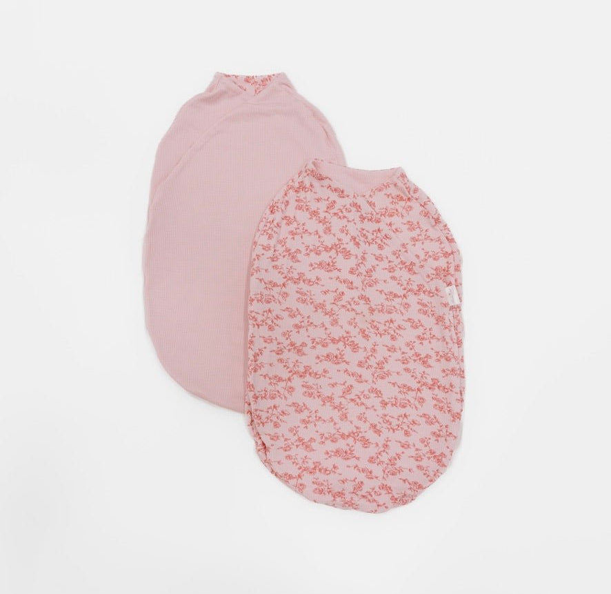 Bitty pink blooms design baby cocoon swaddle in silky modal fabric.