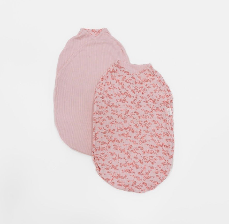 Bitty pink blooms design baby cocoon swaddle in silky modal fabric.