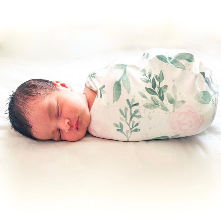 Blushing eucalyptus design baby cocoon swaddle.