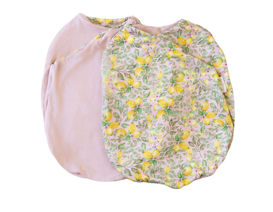 Pink lemonade design baby cocoon swaddle in classic brushed fabric.