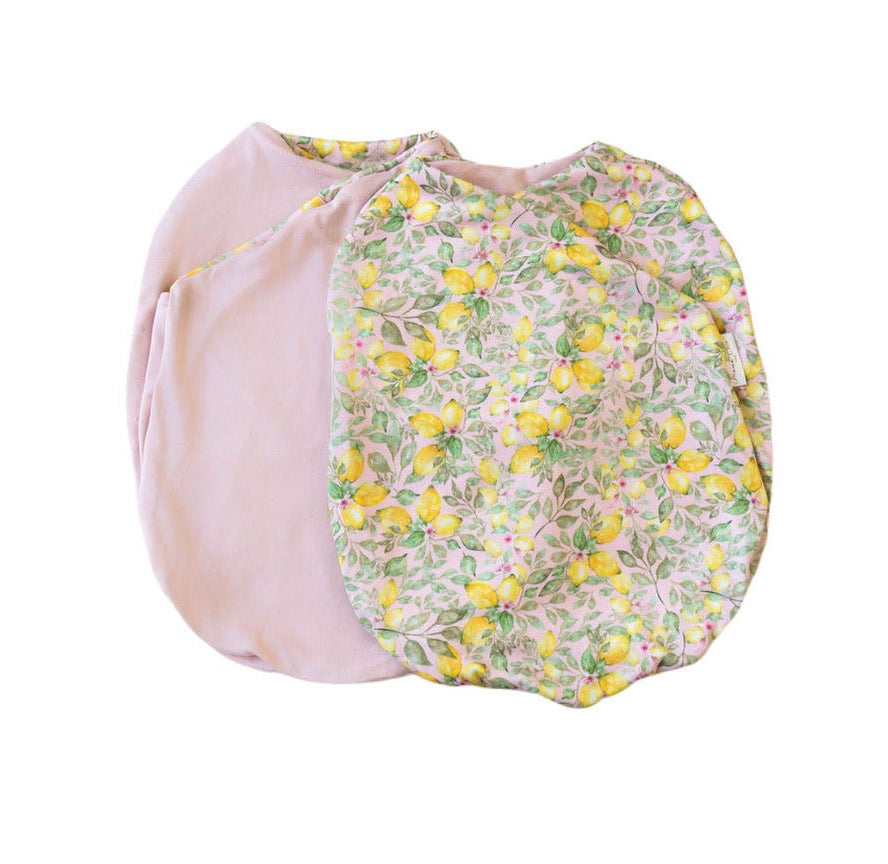 Pink lemonade design baby cocoon swaddle in classic brushed fabric.