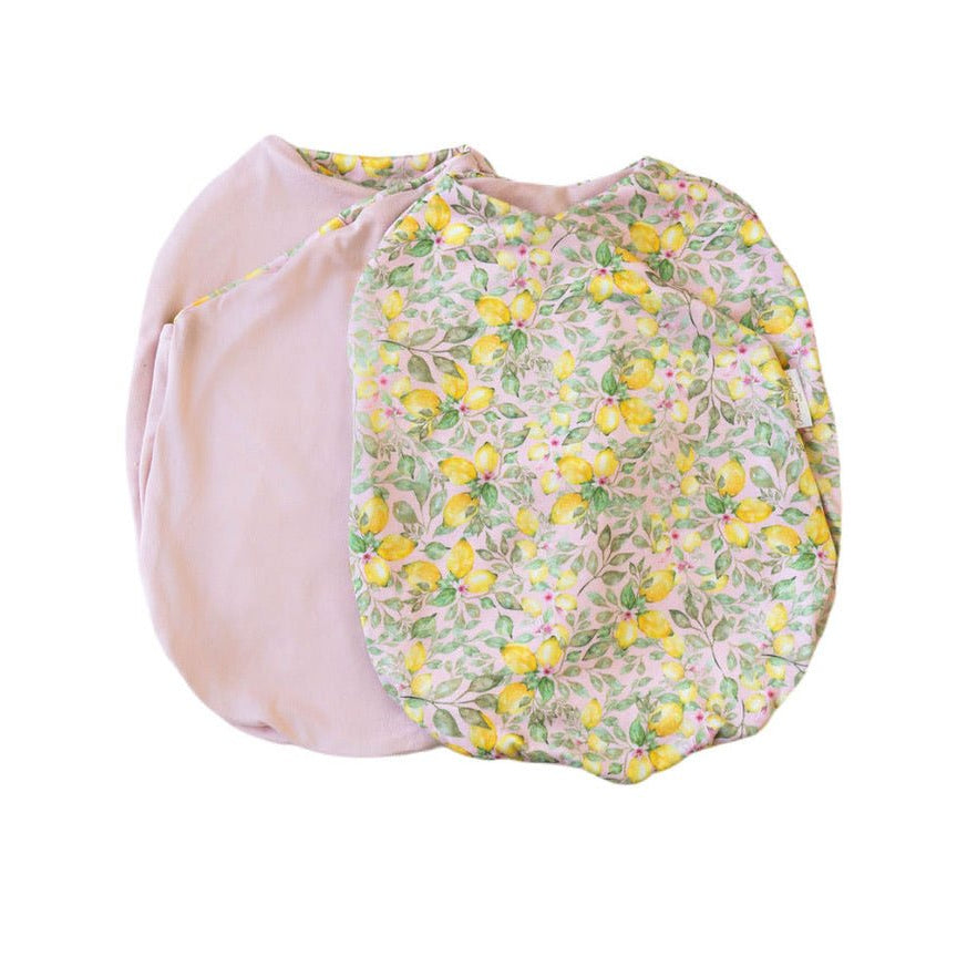 Pink lemonade design baby cocoon swaddle in classic brushed fabric.