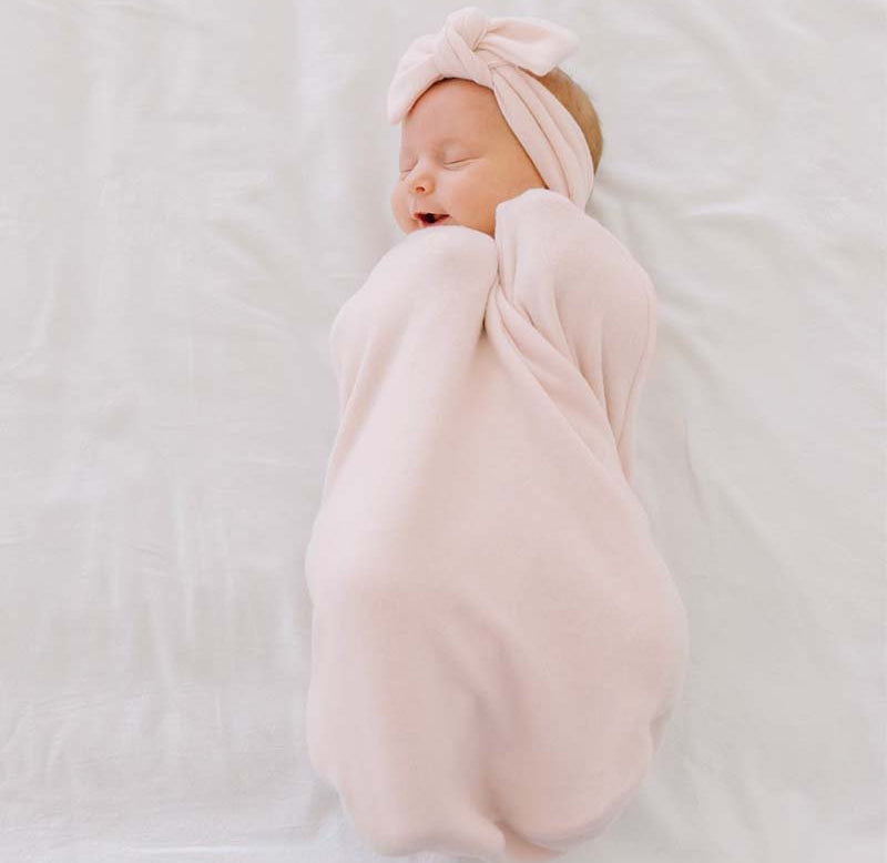 Reversible baby cocoon swaddle.