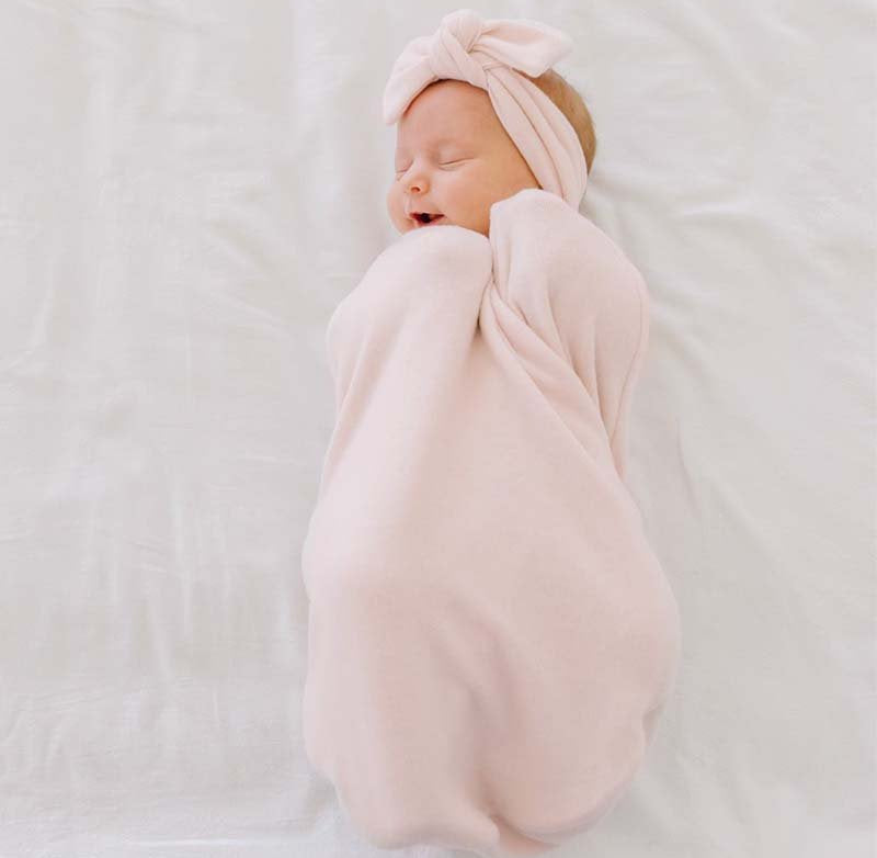 Reversible baby cocoon swaddle.