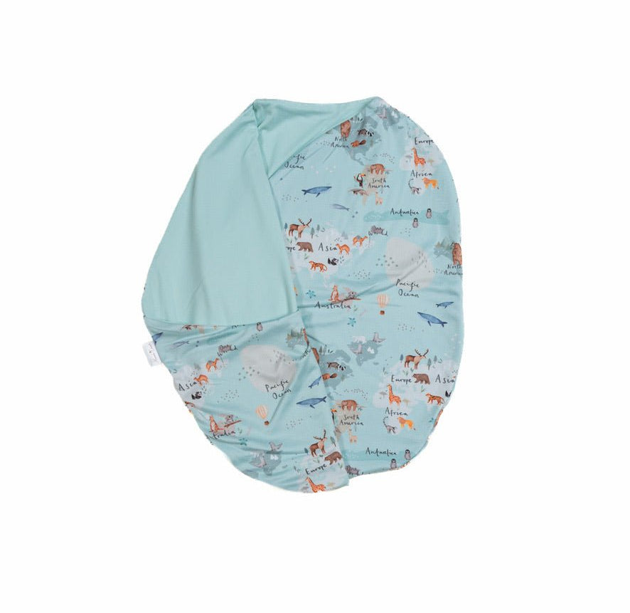 Baby cocoon swaddle featuring our world traveler design, made from classic brushed fabric.