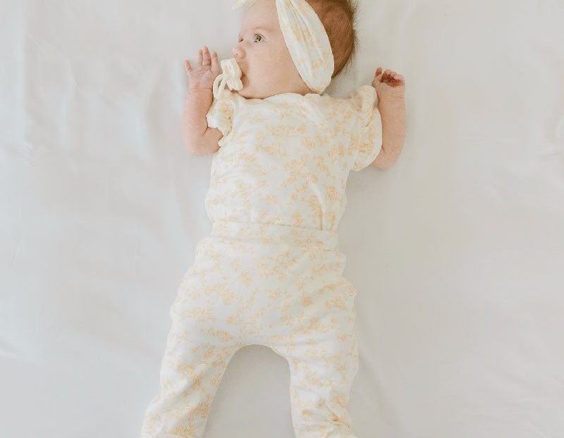 Bitty Blooms baby footie pants crafted from silky modal fabric for everyday comfort.