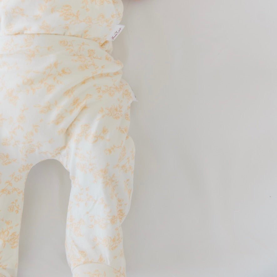 Baby footie pants in bitty blooms design.