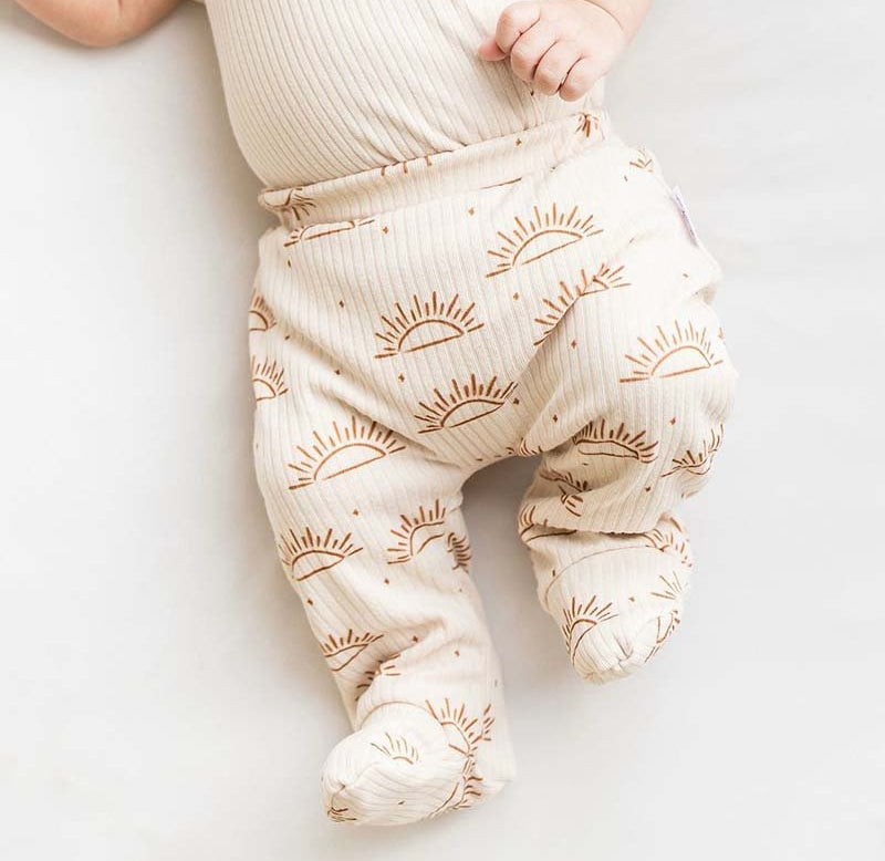 Sandy sunsets design footie pants from our onesie bundle.