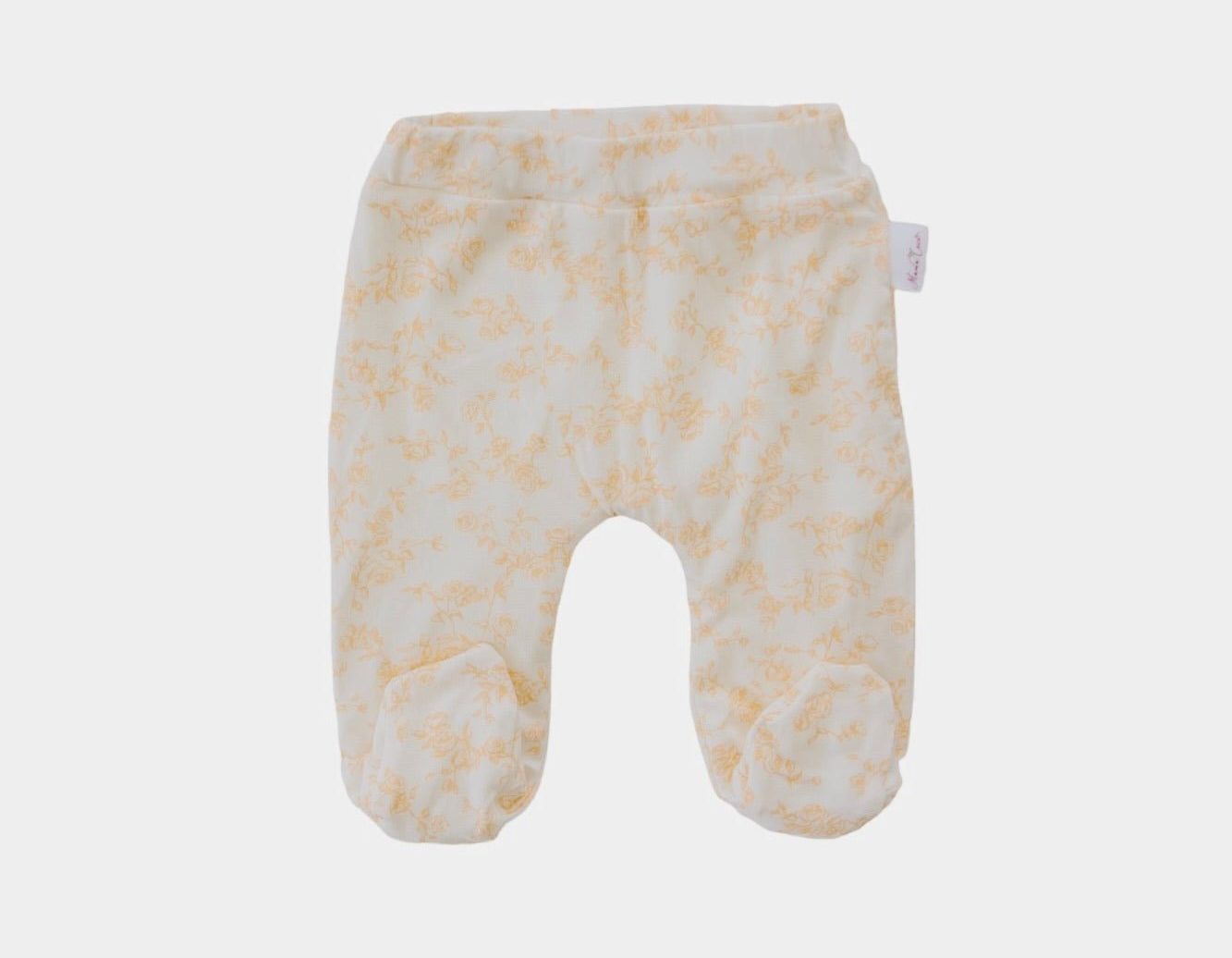 Soft and gentle baby footie pants made from silky modal fabric in the Bitty Blooms design.