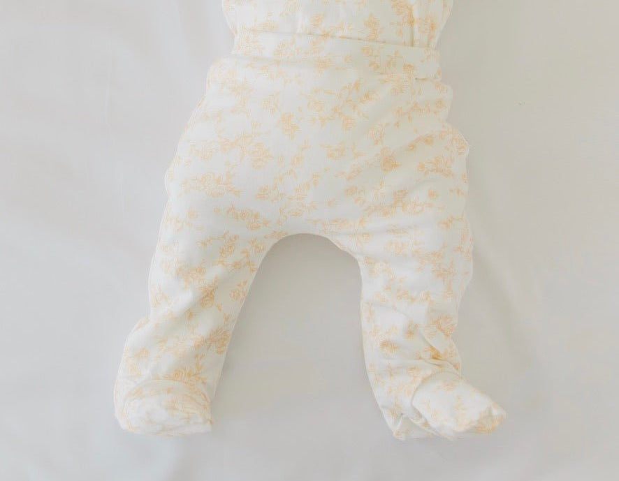 Silky modal baby footie pants featuring the charming Bitty Blooms design.