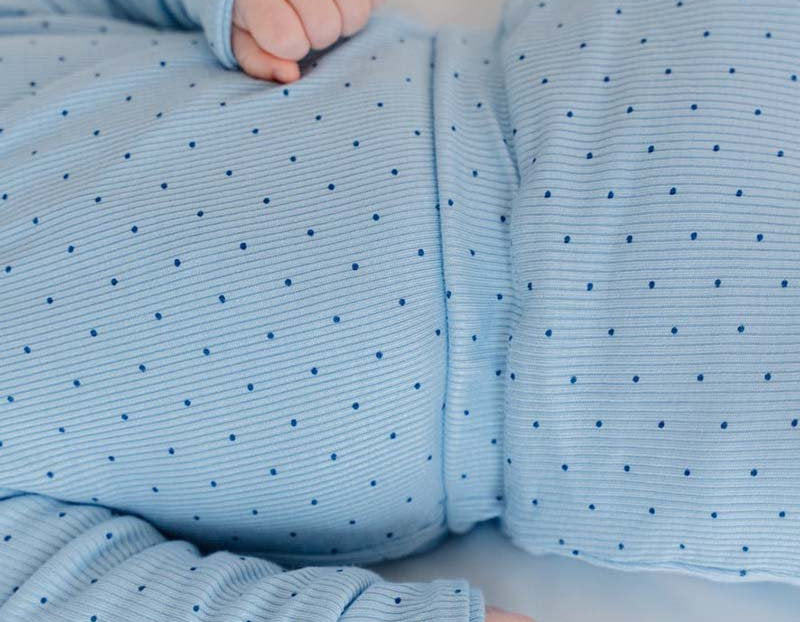 Bamboo organic cotton baby footie pants featuring the charming Dotted Blues design.