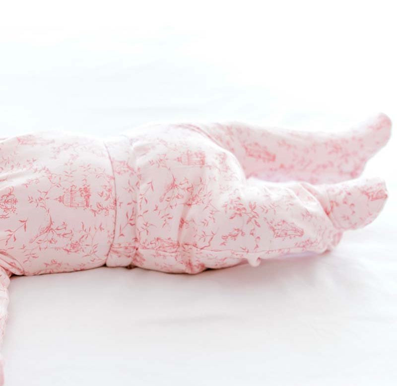 Bamboo cotton footie pants for babies in a charming Whimsical Garden pattern.