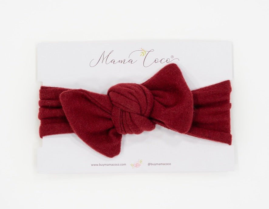 Headwrap with bow for baby in Plush Dark Cherry fabric styles.