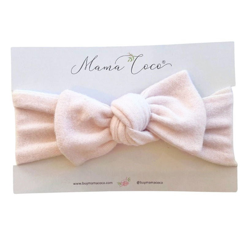 Headwrap with bow for baby in Plush Pink Cashmere fabric styles.
