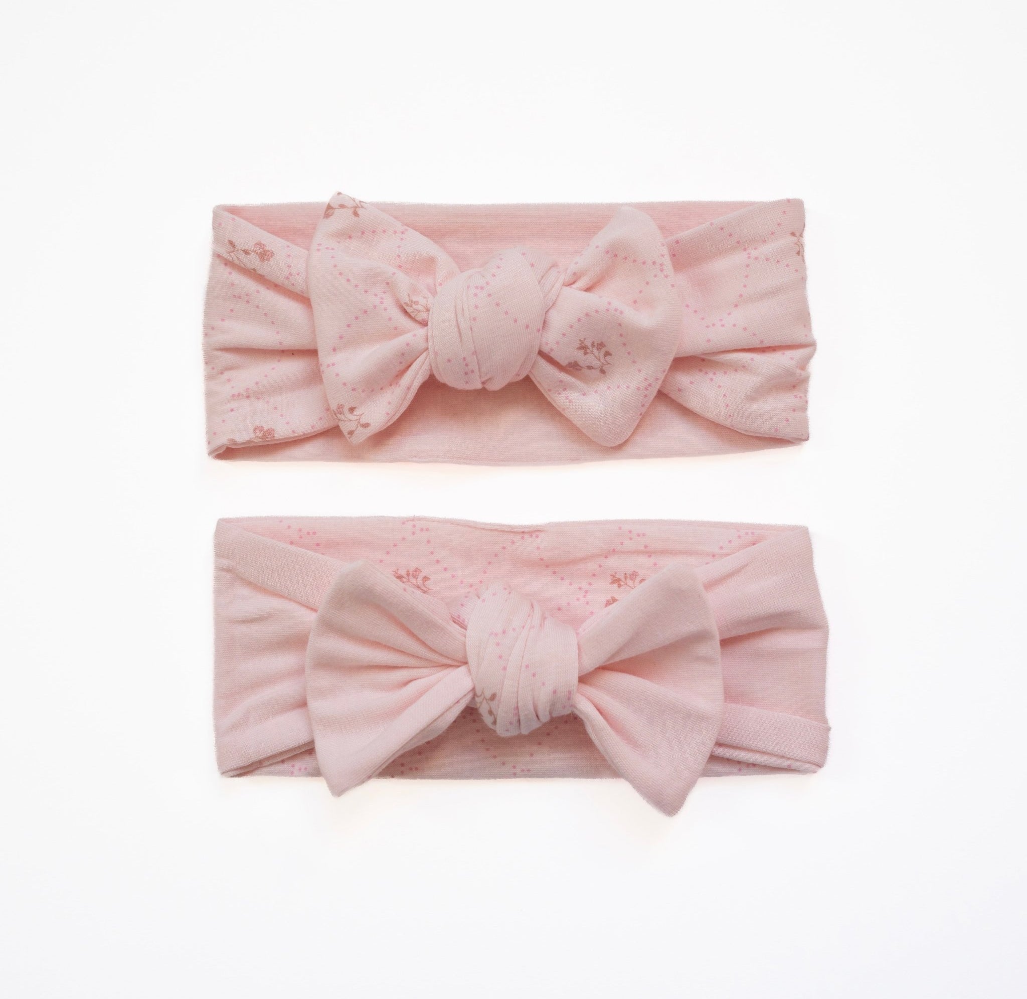 Headwrap with bow for babies made from bamboo organic cotton fabric, in dainty dots design.