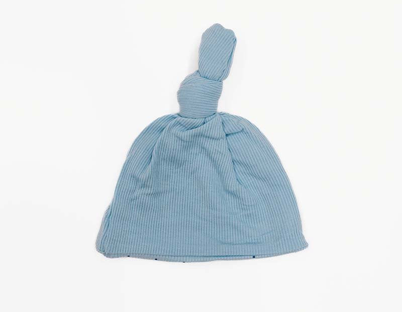 Dotted Blues design knotty beanie for babies, made from Silky Modal fabric.