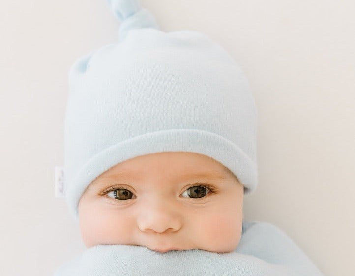 Knotty beanie for babies in Plush Powder Blue design, made from Plush Dream fabric.