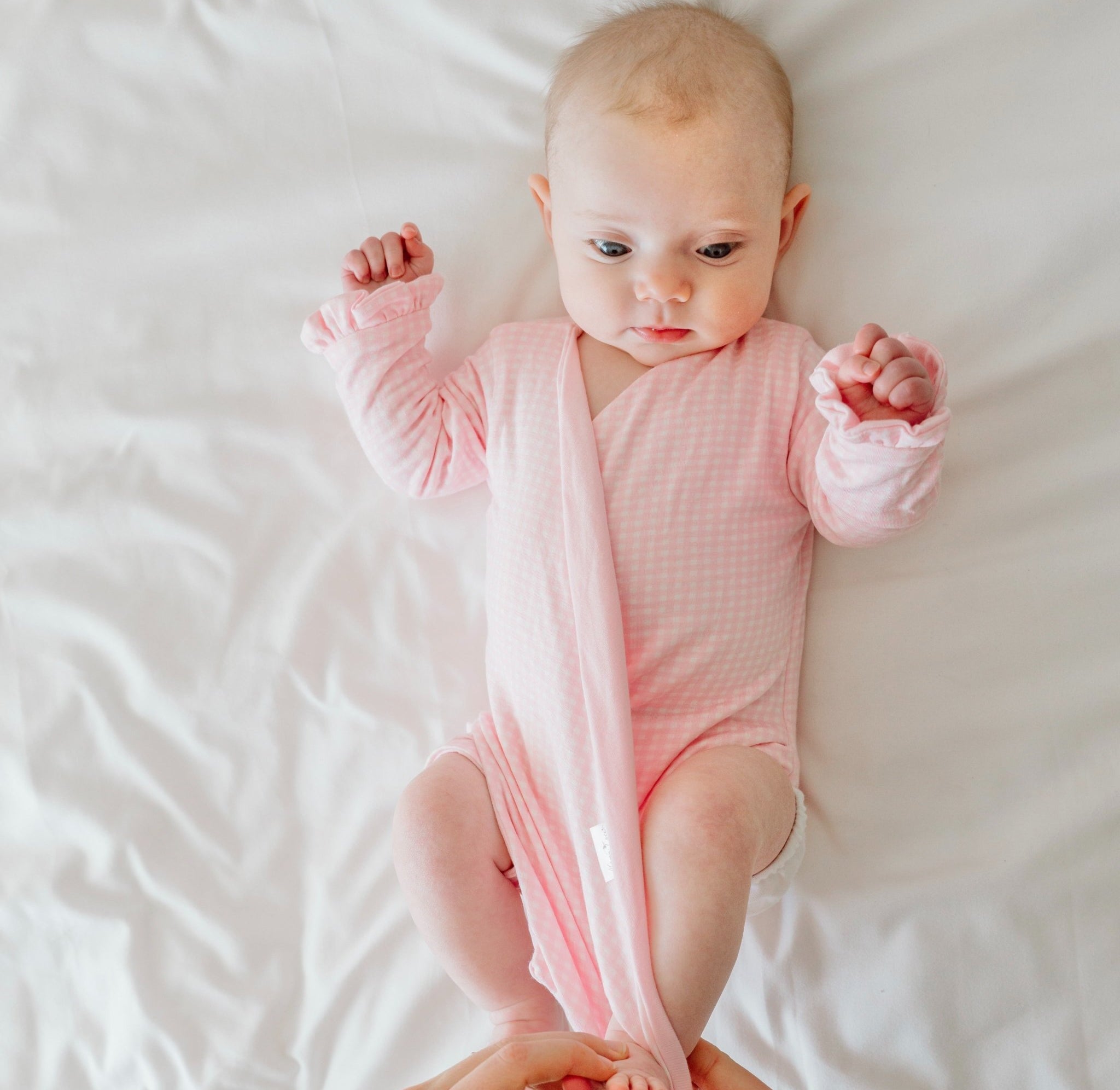 Baby Pink Gingham design ruffle cuff winged bodysuit for babies in silky modal fabric.