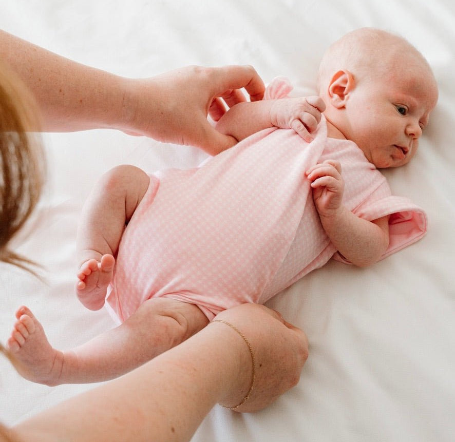 Baby Pink Gingham design flutter sleeve baby onesie in silky modal fabric.