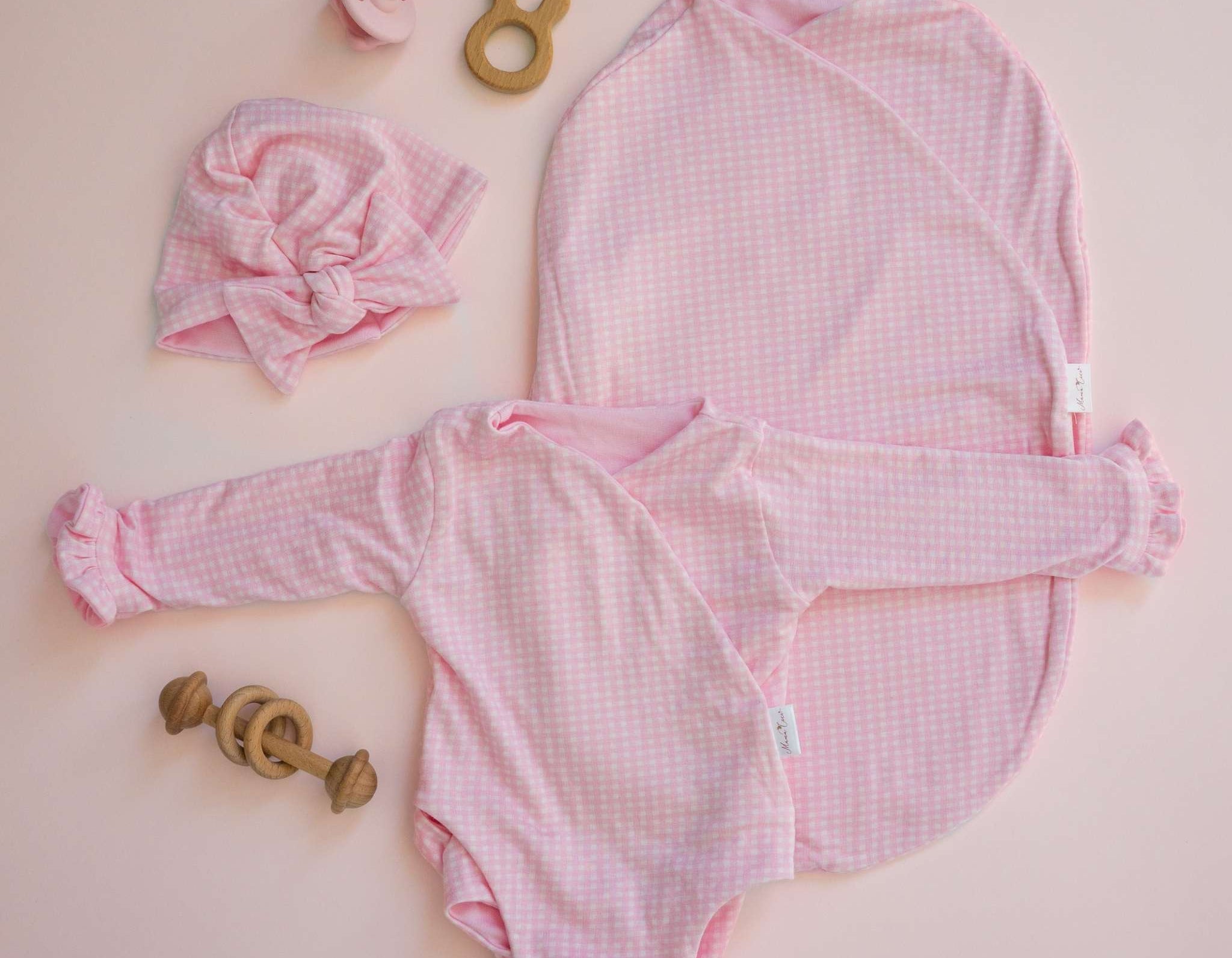 Silky modal long sleeve newborn baby bundle, featuring adorable ruffle cuffs in baby pink gingham design.