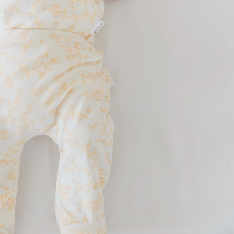 Cozy baby footie pants in silky modal fabric with an adorable Bitty Blooms pattern.