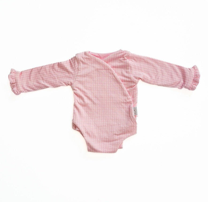 Ruffle cuff winged bodysuit made from silky modal fabric in Baby Pink Gingham design.