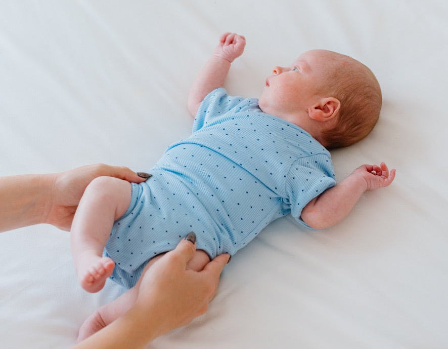 Baby winged bodysuit made from silky modal fabric in Dotted Blues design.
