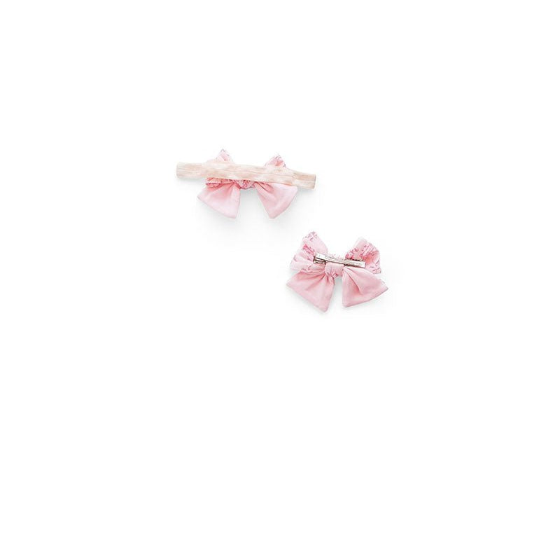 Back view of our bamboo cotton baby headband & bow set in whimsical garden design.