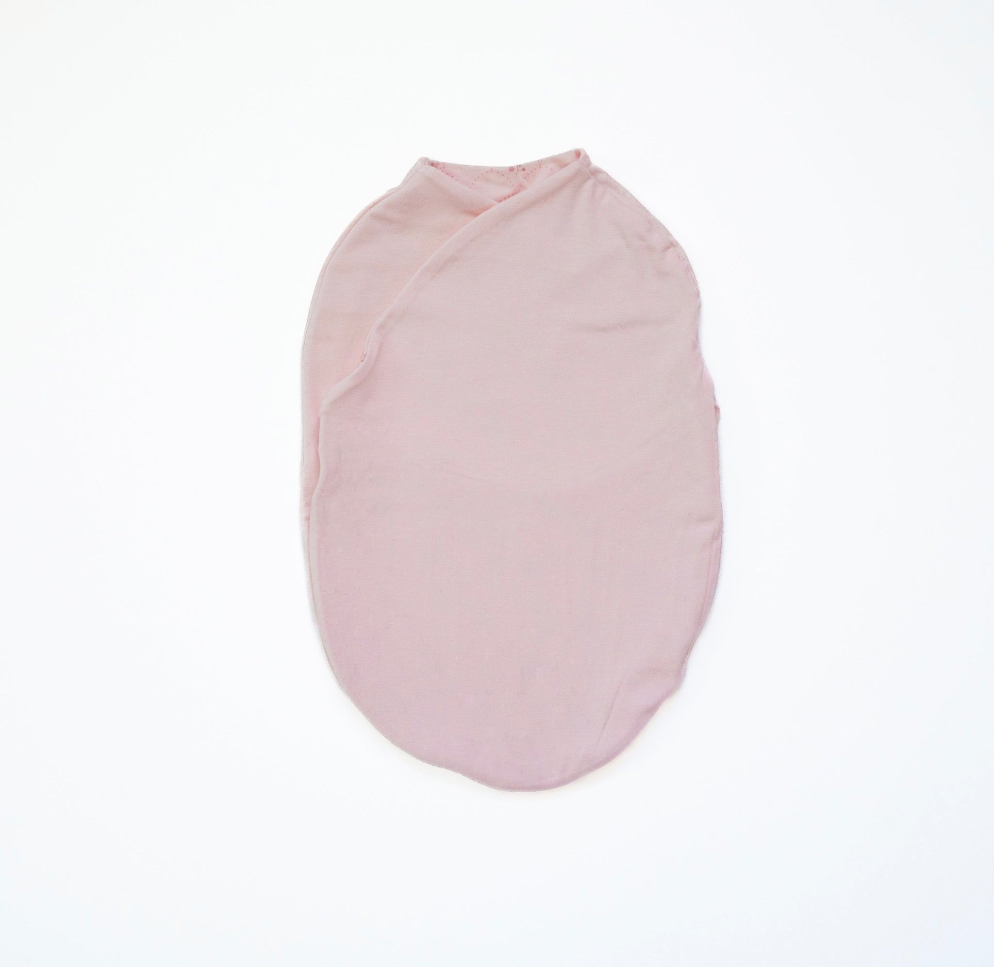 Reversible baby swaddle cocoon blanket crafted from bamboo and organic cotton fabric, decorated with Dainty Dots.