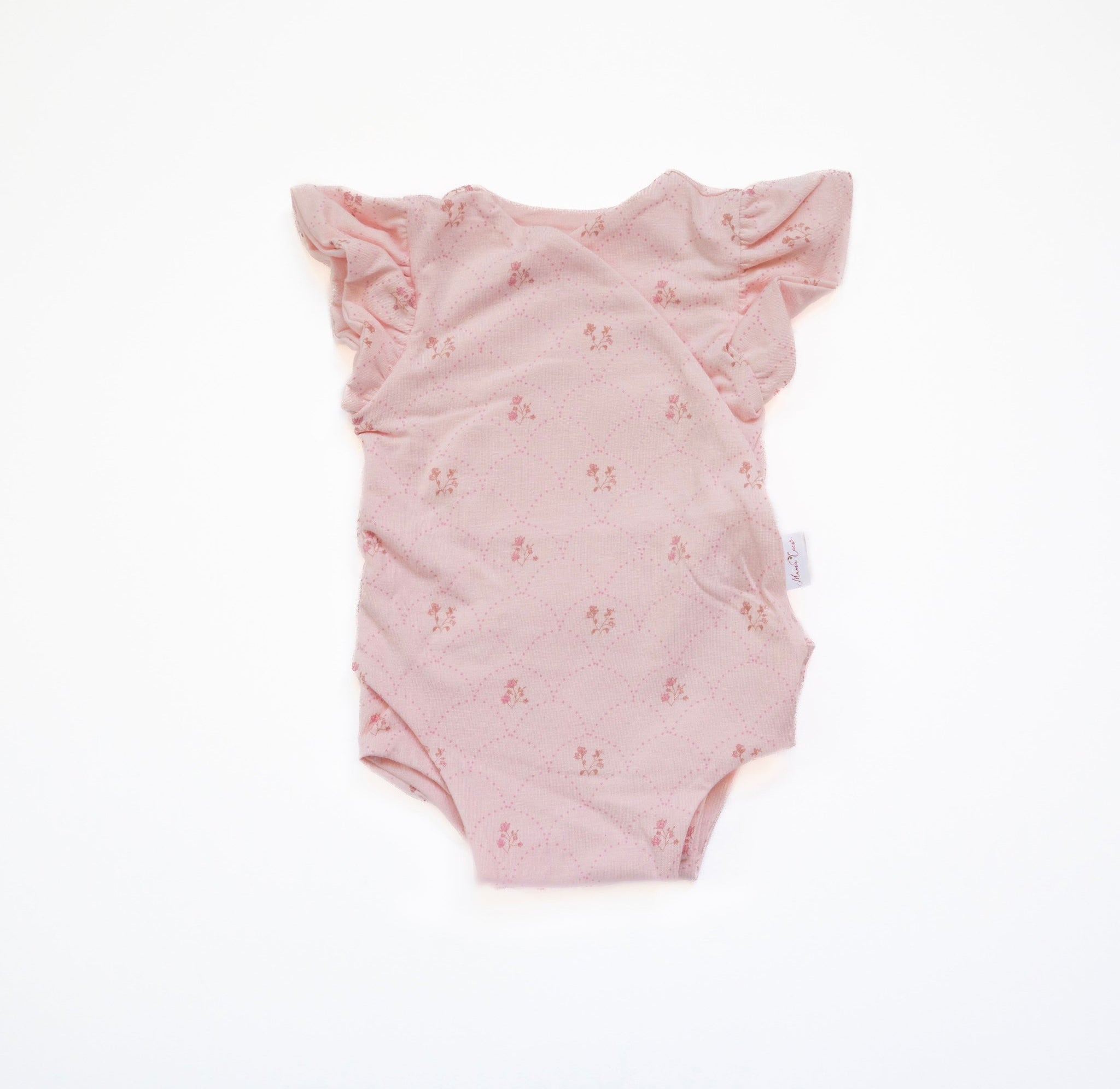 Flutter sleeve winged bodysuit for babies in dainty dots design.