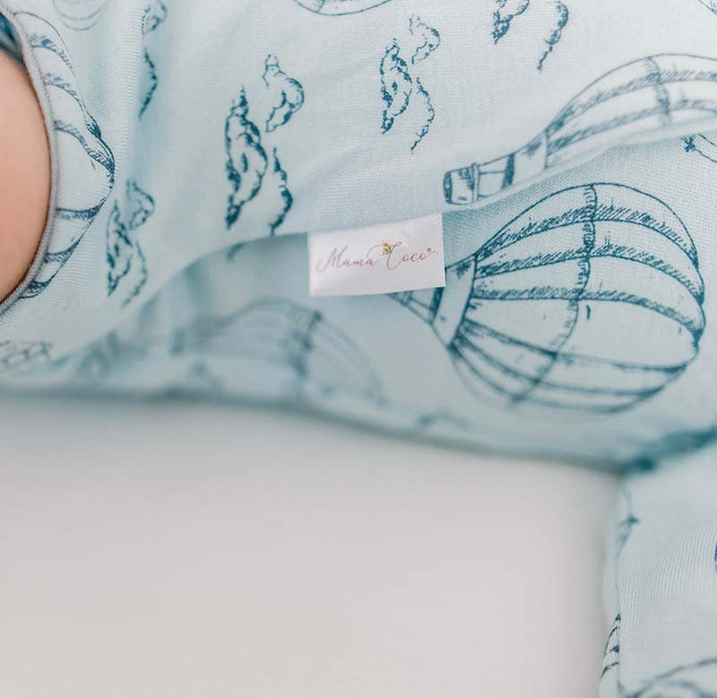 Long-sleeve winged bodysuit for babies.