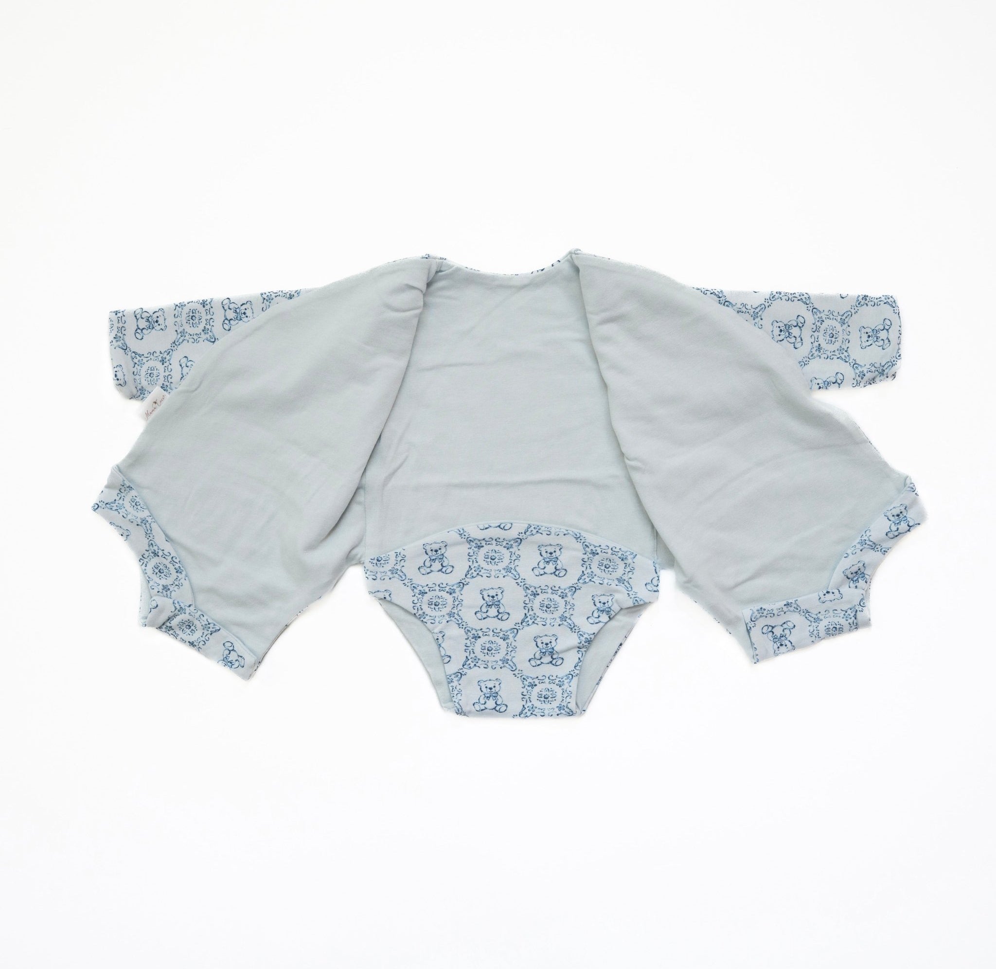 Reversible long-sleeve winged bodysuit for babies.