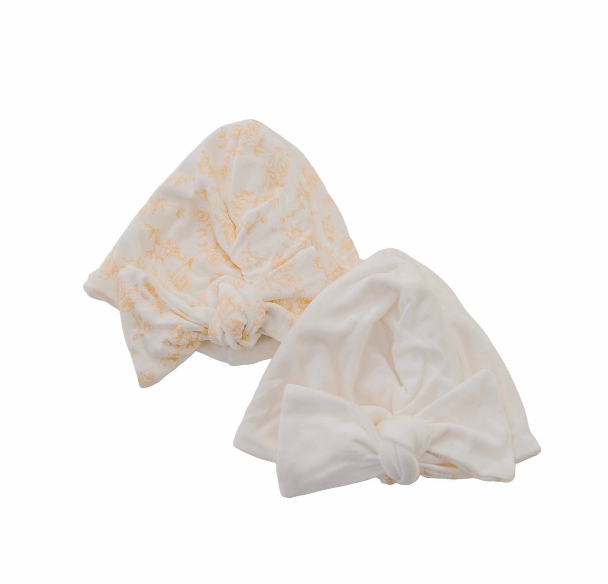 Ruched baby beanies with bows crafted in soft Bitty Blooms design Silky Modal fabric.