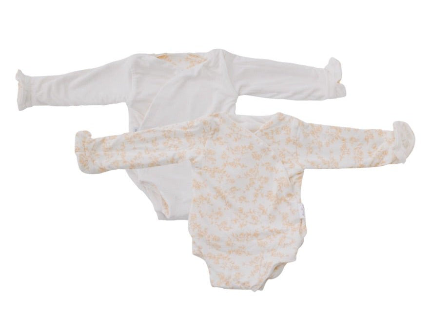 Reversible bitty blooms design baby onesie outfit in silky modal fabric.