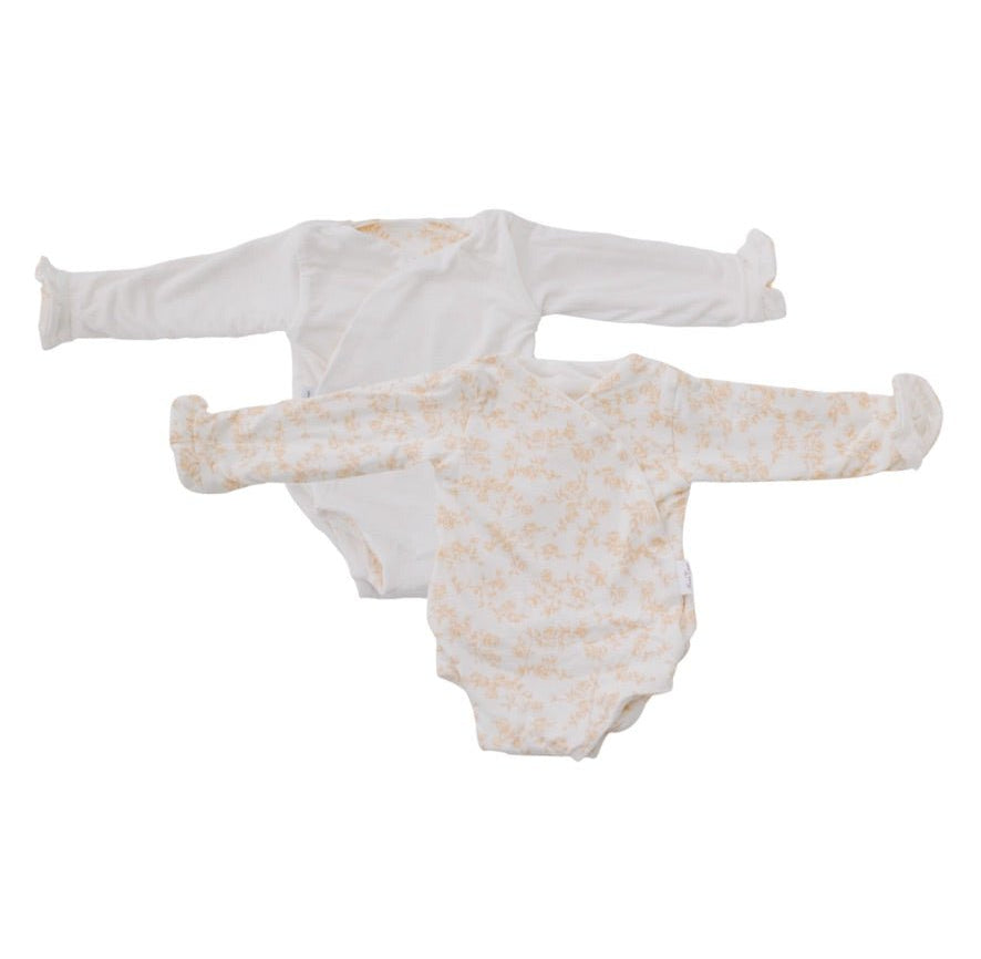 Reversible bitty blooms design baby onesie outfit in silky modal fabric.