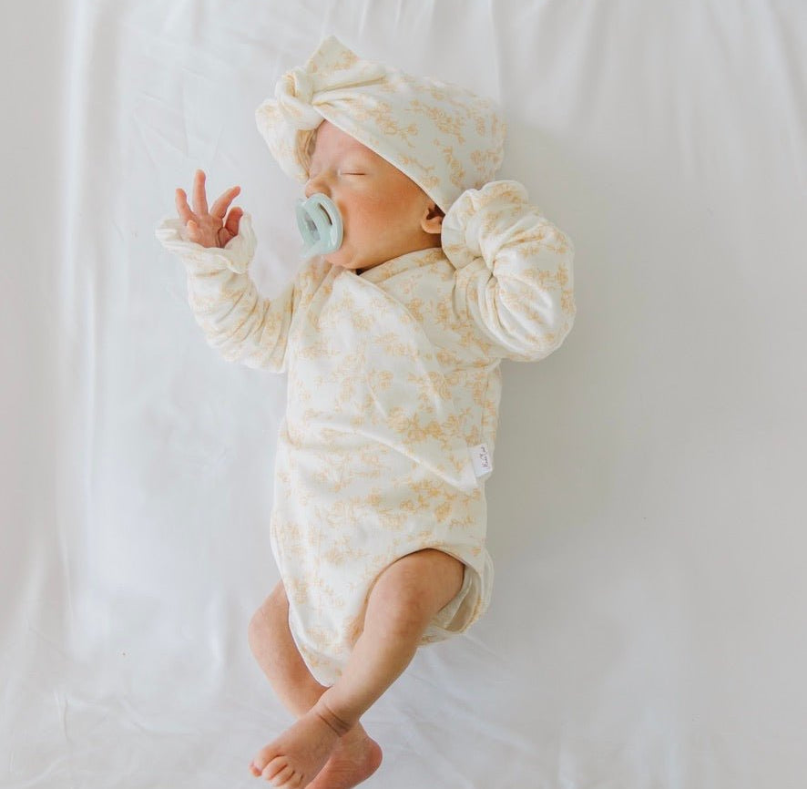 Bitty blooms design baby onesie outfit in silky modal fabric.