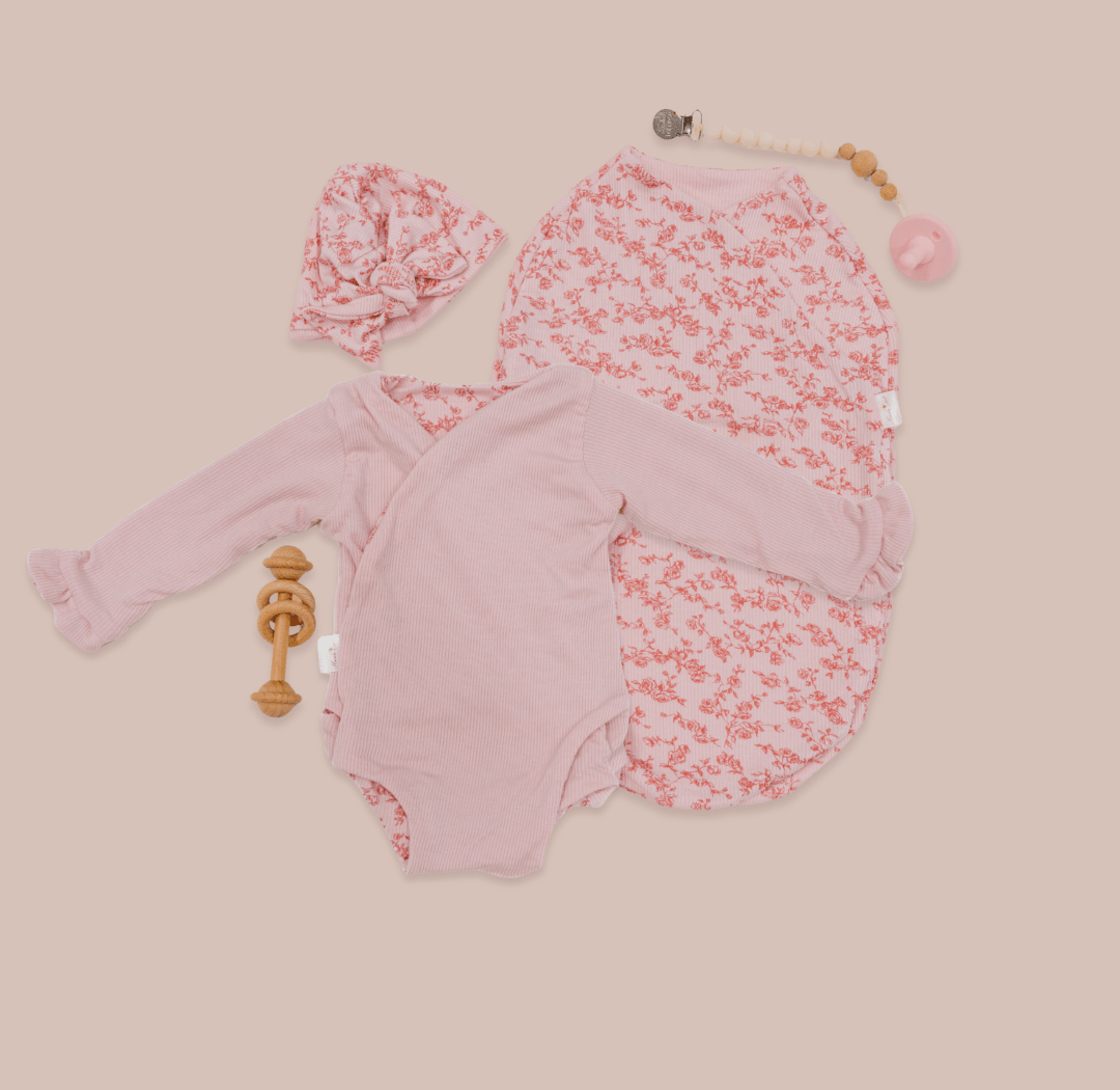 Silky modal long sleeve newborn baby bundle, featuring adorable ruffle cuffs in bitty pink blooms design.
